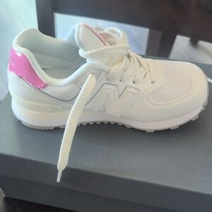 New Balance White Sneaker with Pink Heel Accent